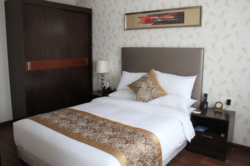 Xiangyang  The Minpha Apartment Hotel Xiangyang الغرفة الصورة